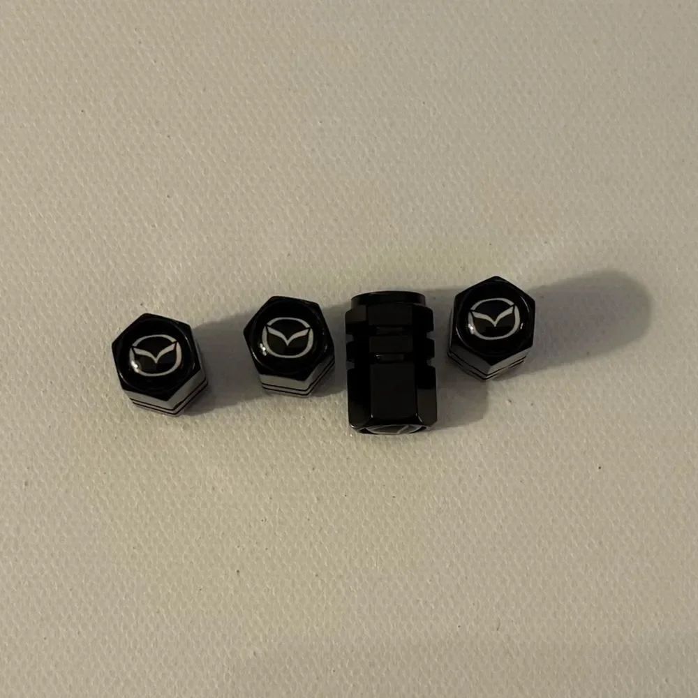 Mazda Valve Stem Caps in Black Set of 4 NWT